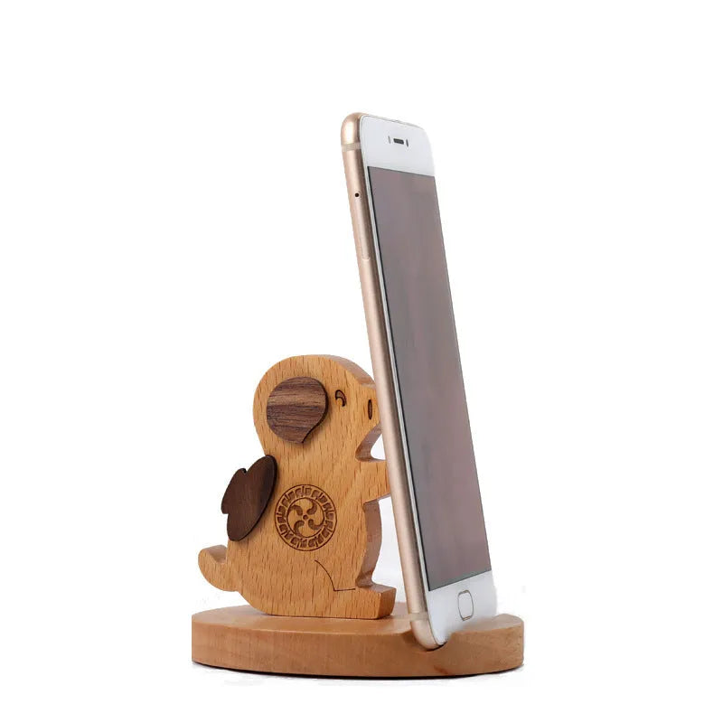 Handcrafted beech wood and resin lazy bracket mobile phone holder on a wooden desk