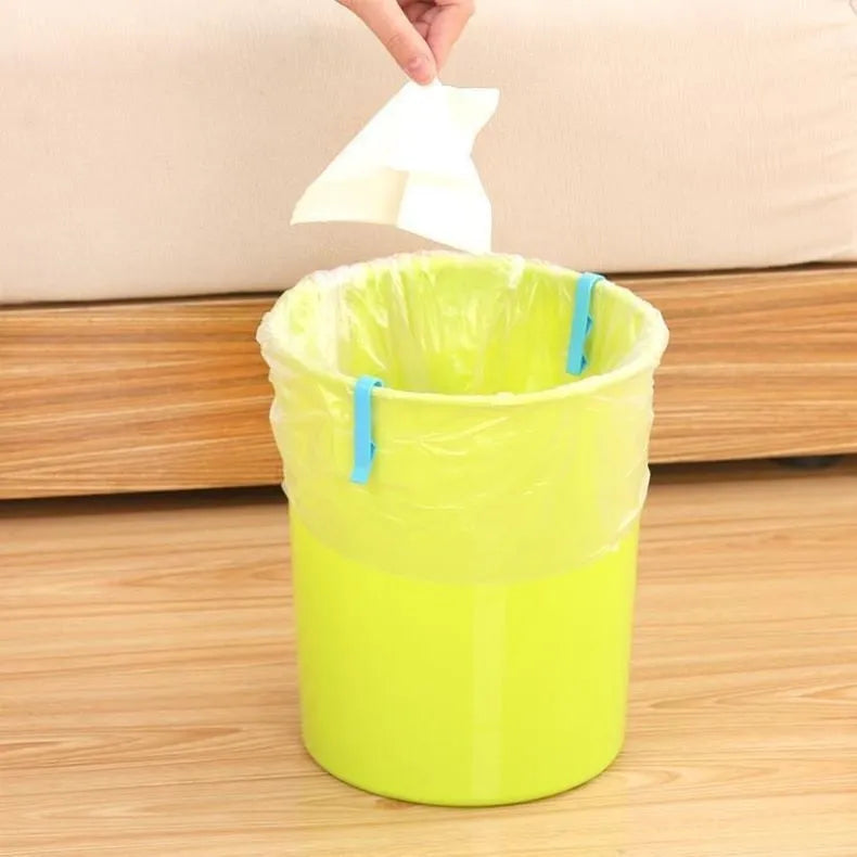 PP plastic non-slip clip for securing a rubbish bag to the side of a bin.