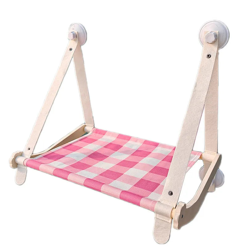 Wooden cat window hammock bed with linen fabric attached to window by suction cups