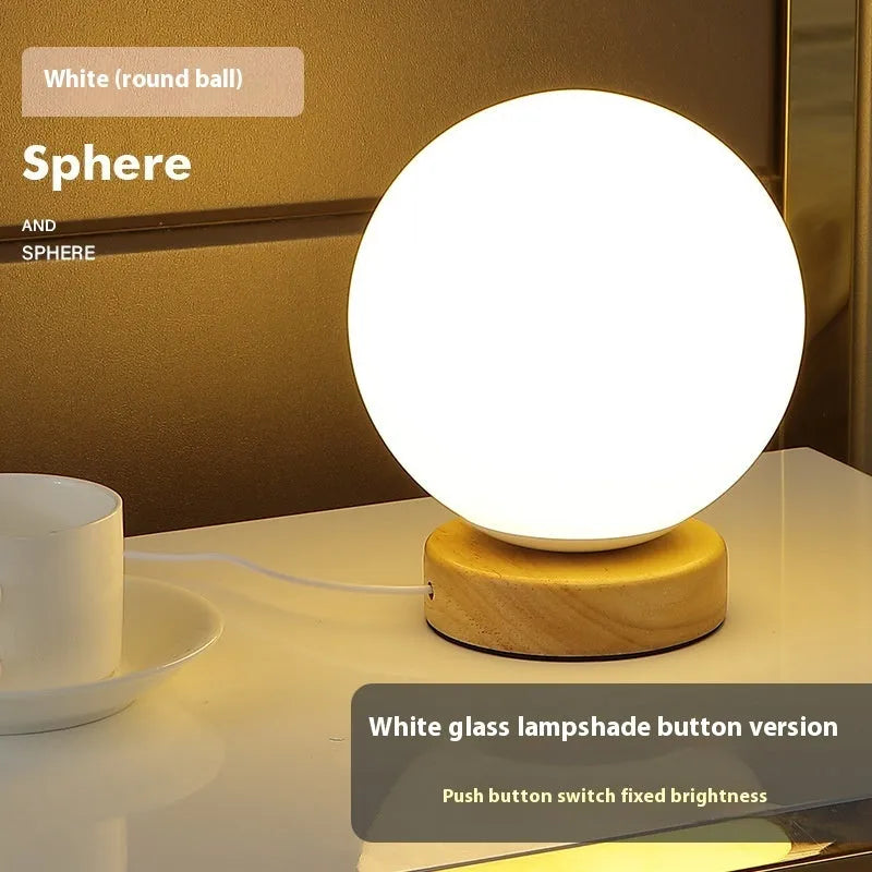 Nordic solid wood base USB table lamp in a choice of cube, column, cylinder, or ball shapes with touch dimming.