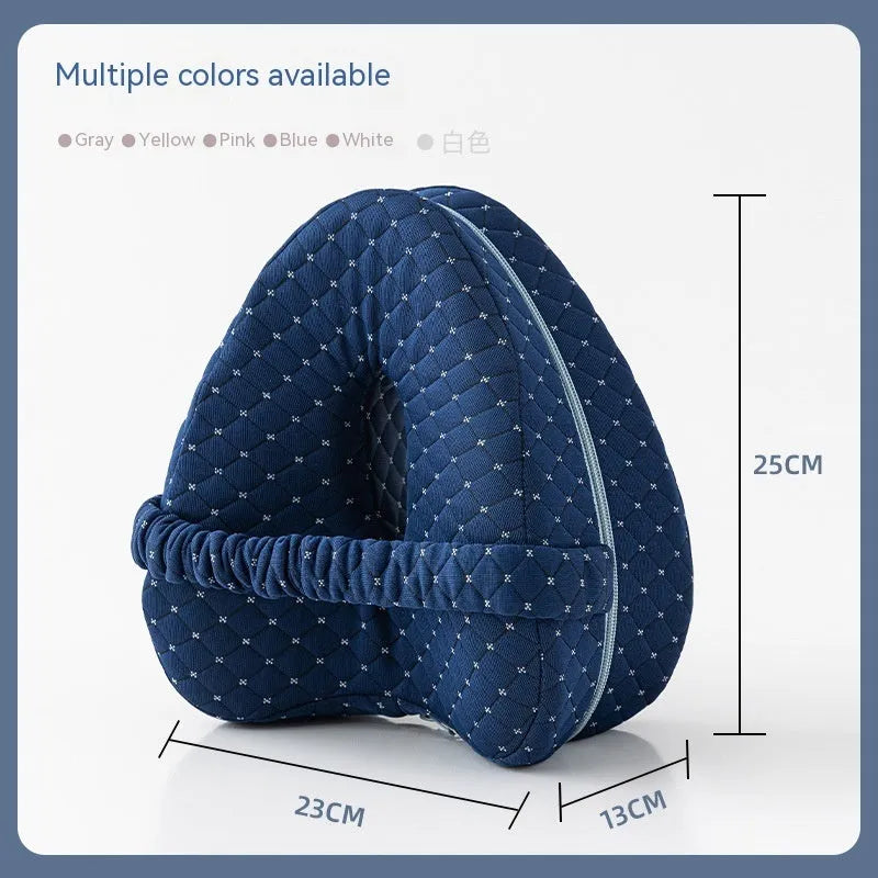 Heart-shaped dark blue memory foam leg pillow for adult use.