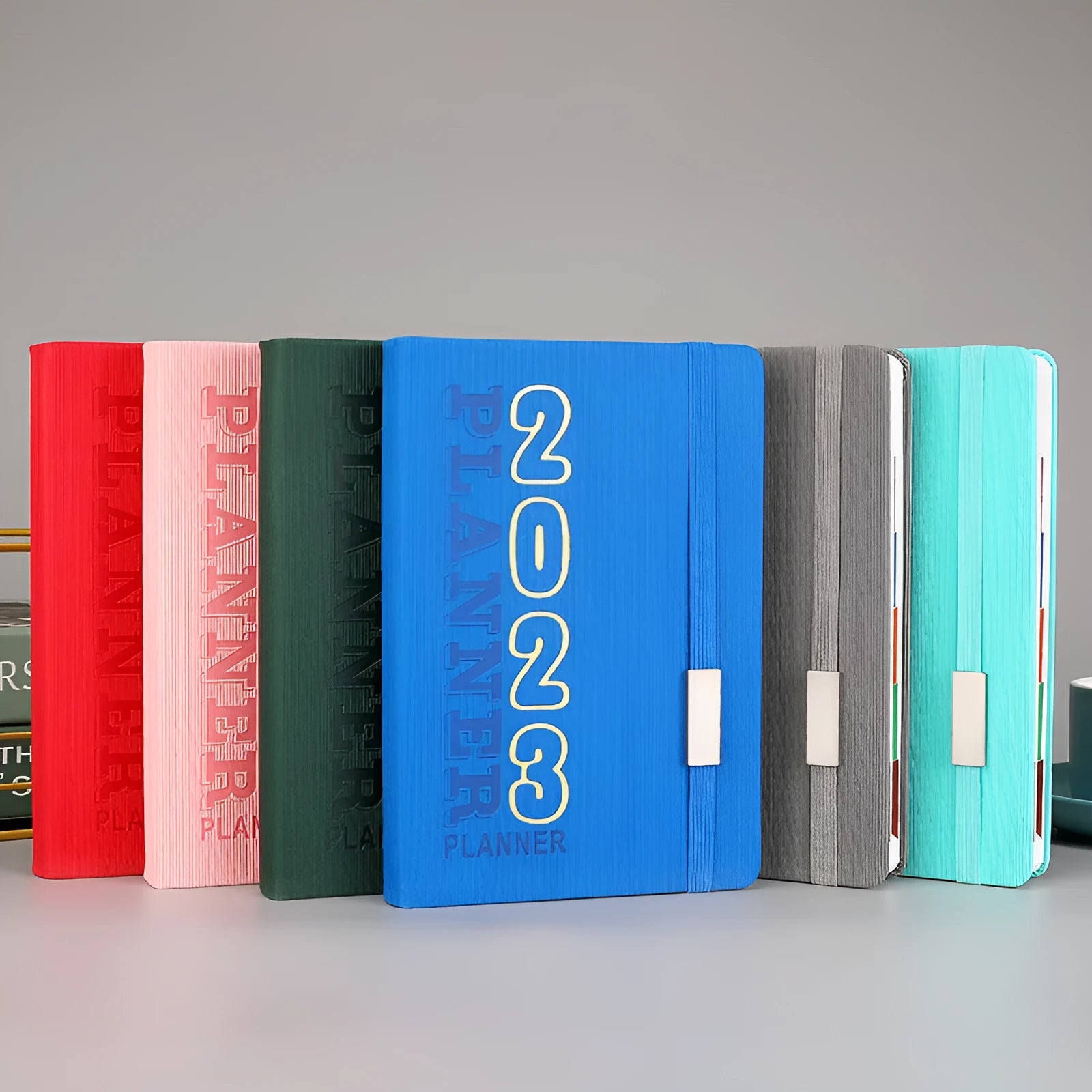 Creative student almanac calendar with imitation leather cover open to show weekly planning pages