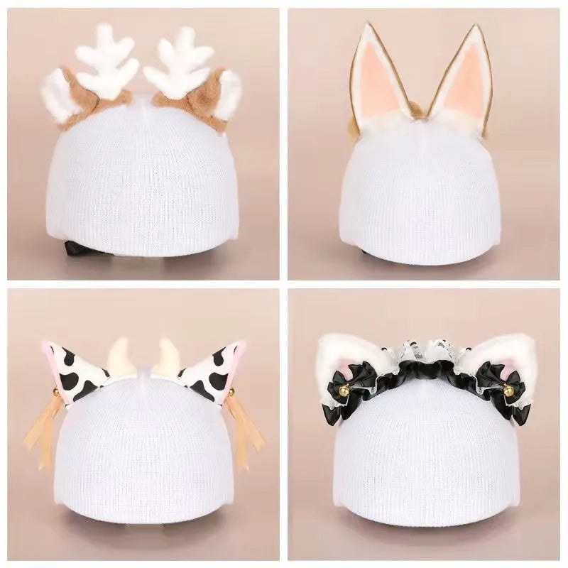 Soft plush cartoon-style decoration sitting on a ski helmet.