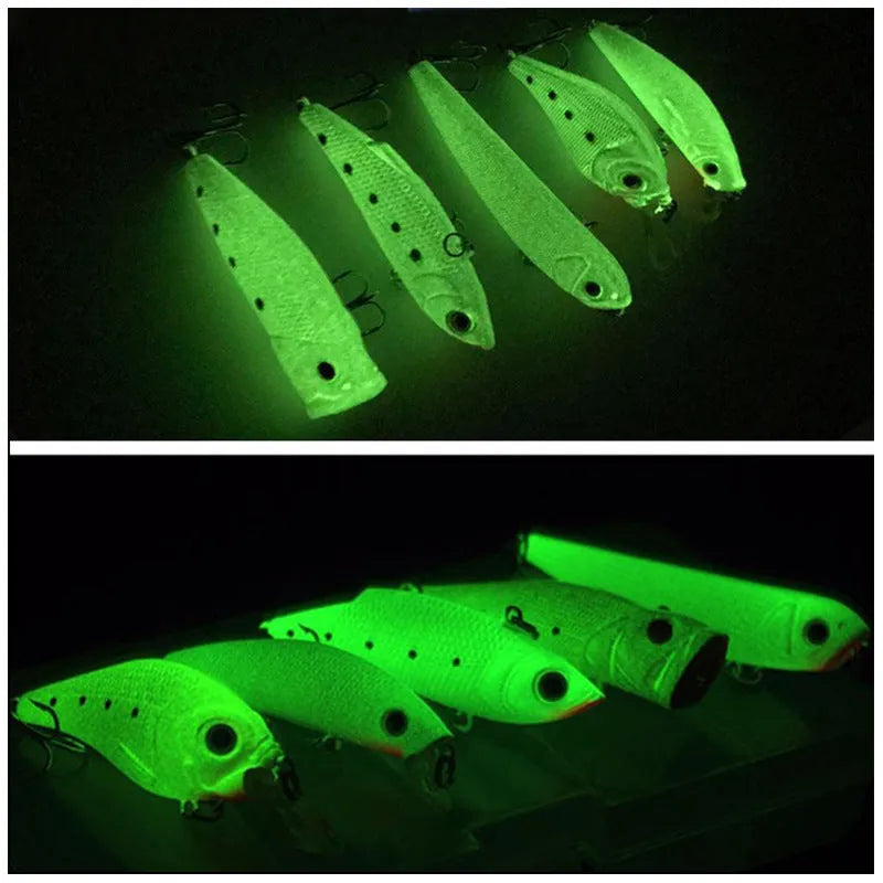 Set of five 3D fluorescent simulation hard bait fishing lures with luminous elements on a blue background.