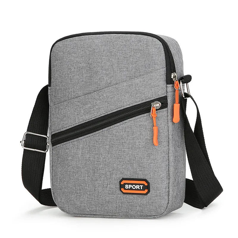 Solid colour crossbody commuter bag in Oxford cloth with ultra-light design and polyester lining