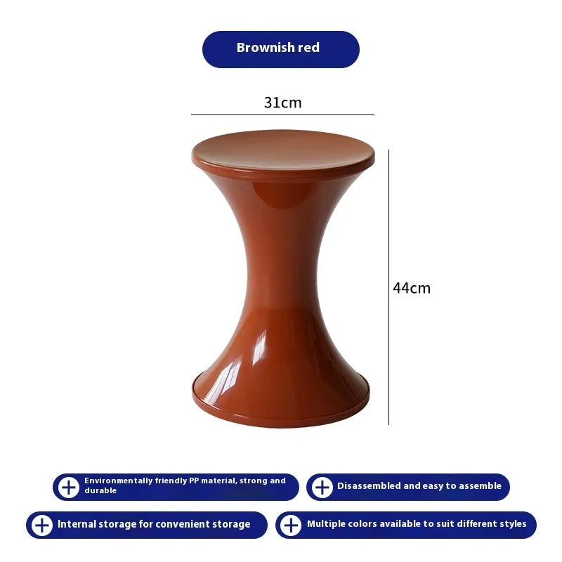 A plastic hourglass-style shoe changing stool in one of five available colours.