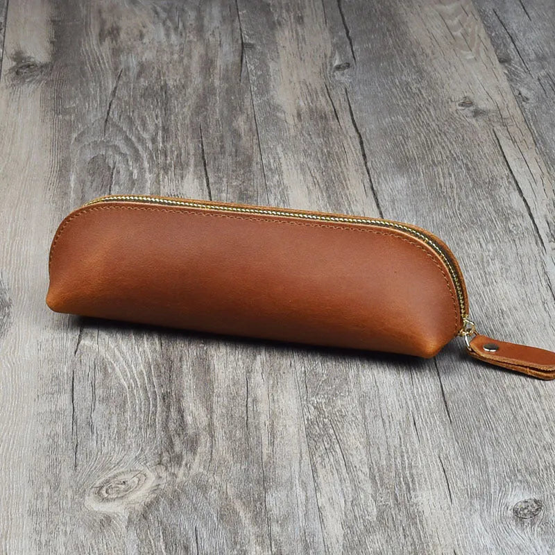 Genuine cowhide leather pencil case with zipper closure measuring 18cm long