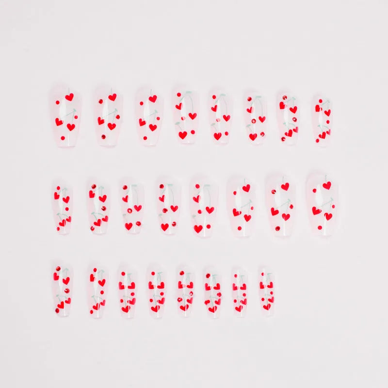 Set of 24 red cherry and diamond shaped nail art decorations for French manicure designs.