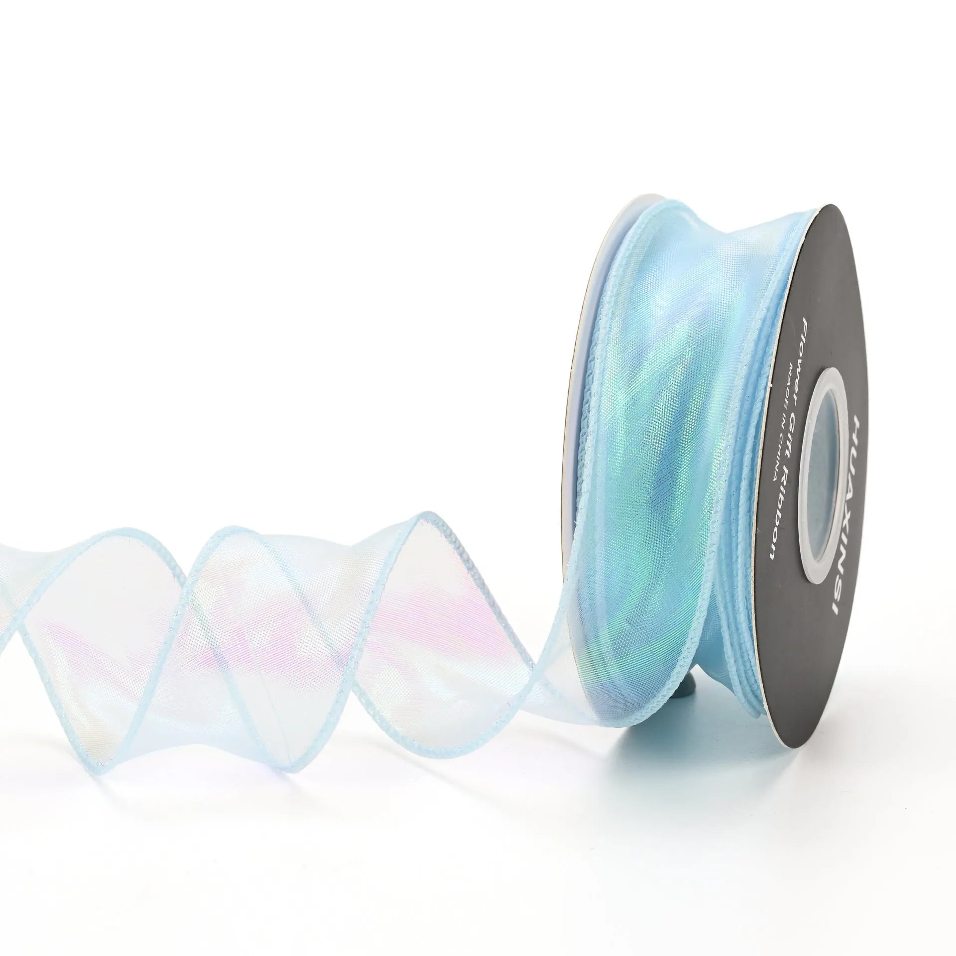 Roll of 4cm wide colourful mesh ribbon with fishtail yarn floral wave design.