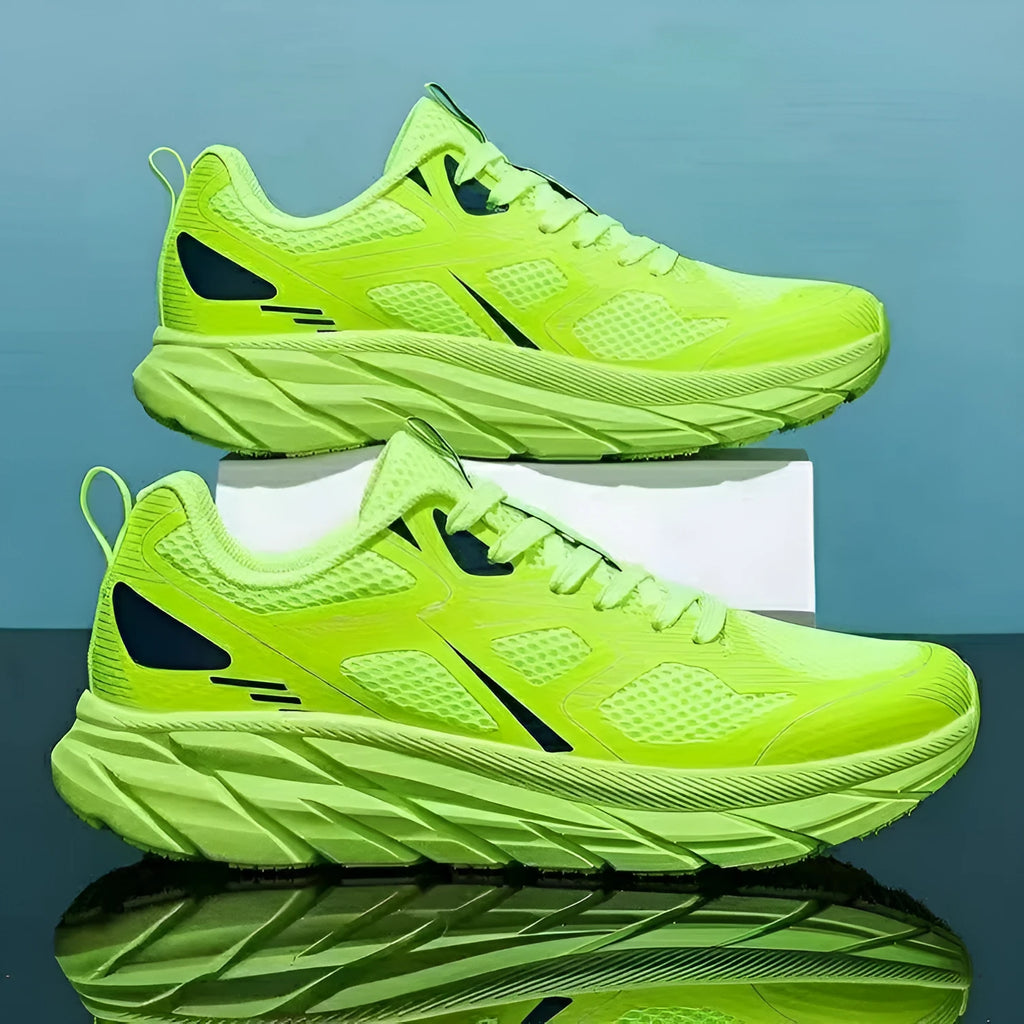 Red, beige, green, gray, and black mesh casual sneakers with round toe and plastic sole.