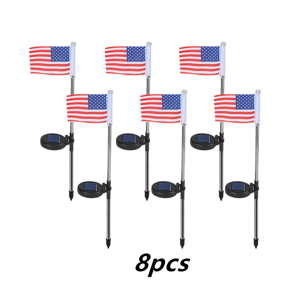 Solar-powered garden flag light with American flag design on stainless steel pole