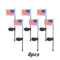 Solar-powered garden flag light with American flag design on stainless steel pole