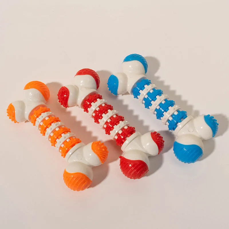 Blue, orange, and red bone-shaped interactive dog chew toy with textured ends and treat compartment.