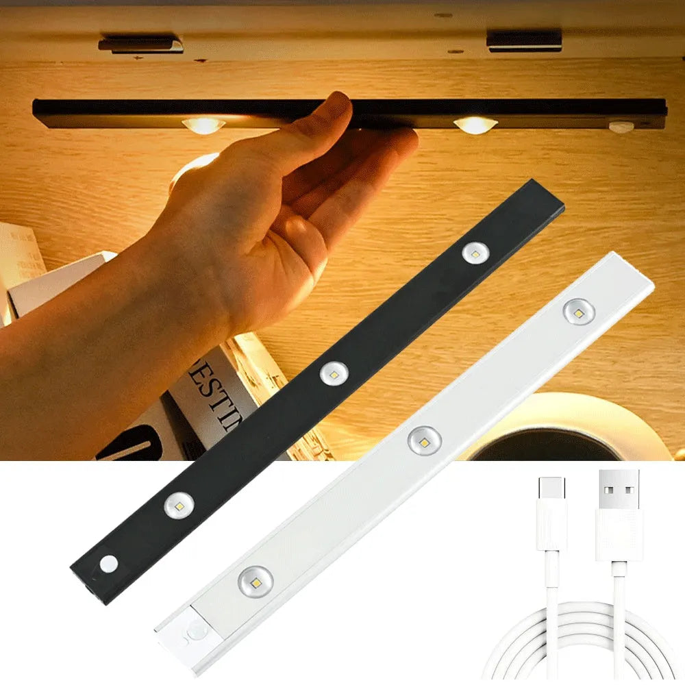 Silver ultra-thin USB rechargeable LED light strip with motion sensor for cabinet mounting.