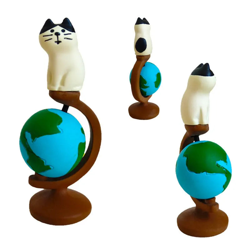 Cartoon cat Statue of Liberty resin statue holding a world globe, Carp Cat and Earth Instrument Cat styles.