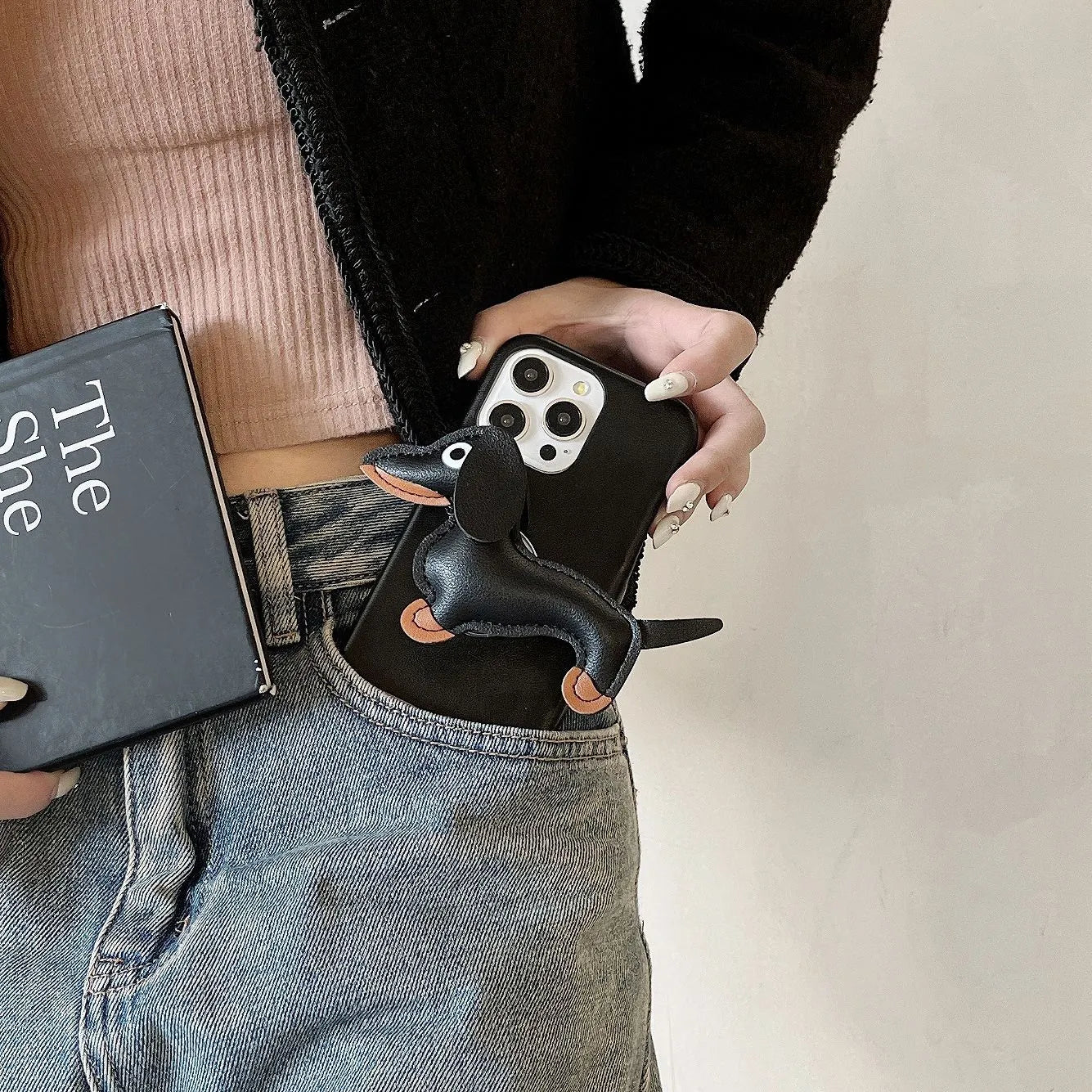 Sausage dog bracket phone case with imitation leather finish in black shell, compatible with iPhone models