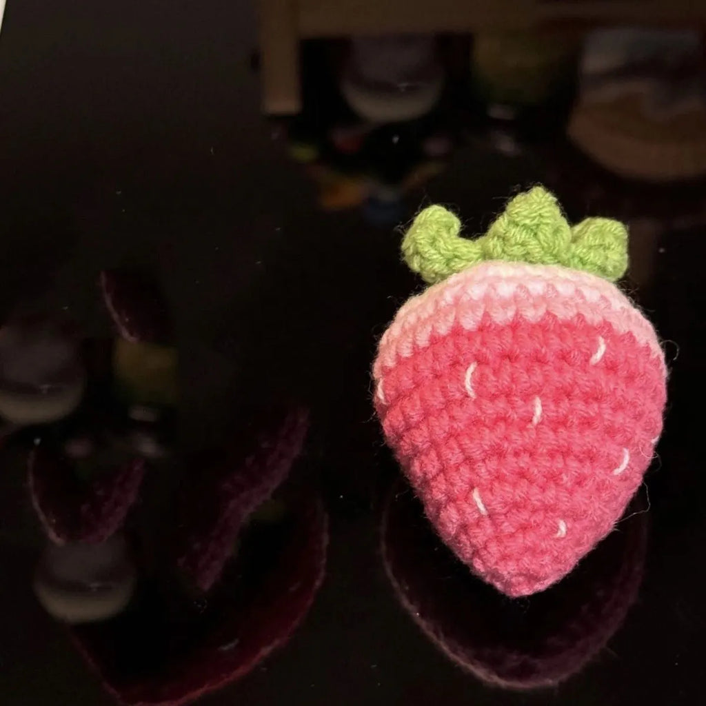 Plush wool strawberry pendant keychain charm in pink or red colour.