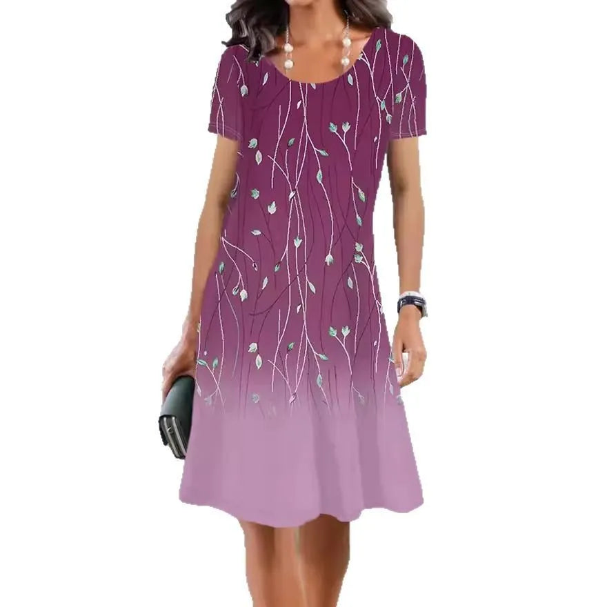 Women's light blue floral print Ice Silk mid-length dress with short sleeves and round neck.