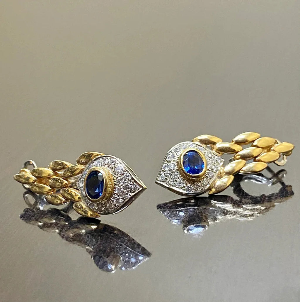 Pair of women's snake motif drop earrings in imitation gold with electroplated alloy finish