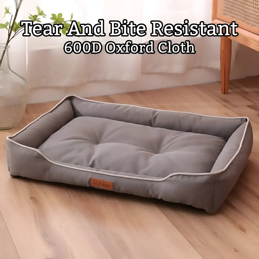 Grey waterproof Oxford cloth dog sofa bed with a high-rebound cushion, shown in a medium size.