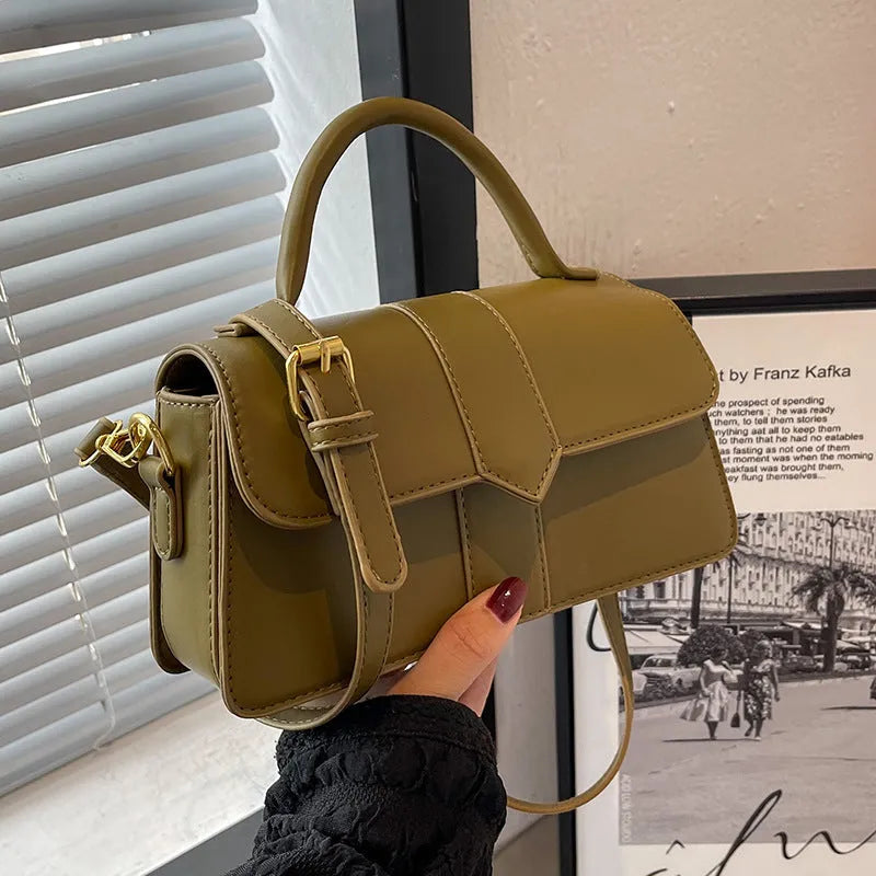 Women's PU leather messenger bag in neutral colour with file organiser interior and sandwich pocket