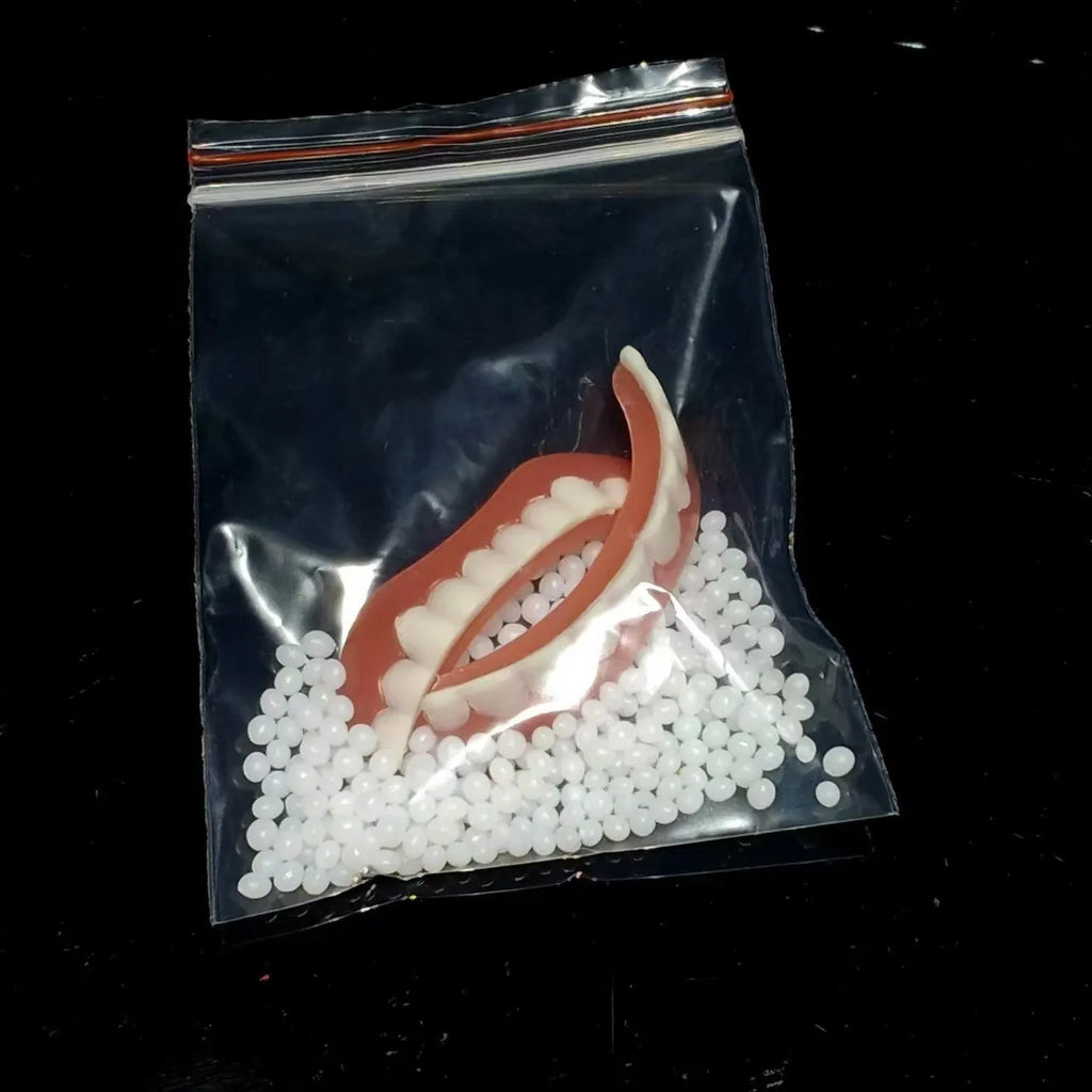 Silicone simulation dentures showing upper and lower teeth set for dental training