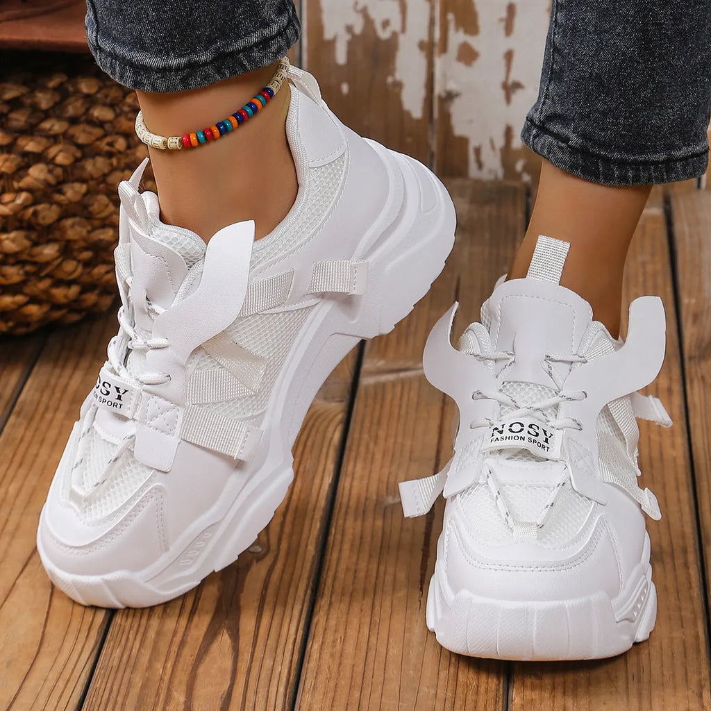 Women's green platform mesh sports shoe with lace-up front and thick sole