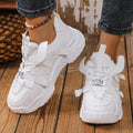 Women's green platform mesh sports shoe with lace-up front and thick sole