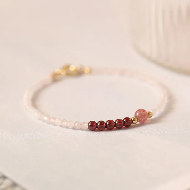 Handmade pink strawberry quartz crystal bracelet with animal zodiac charm