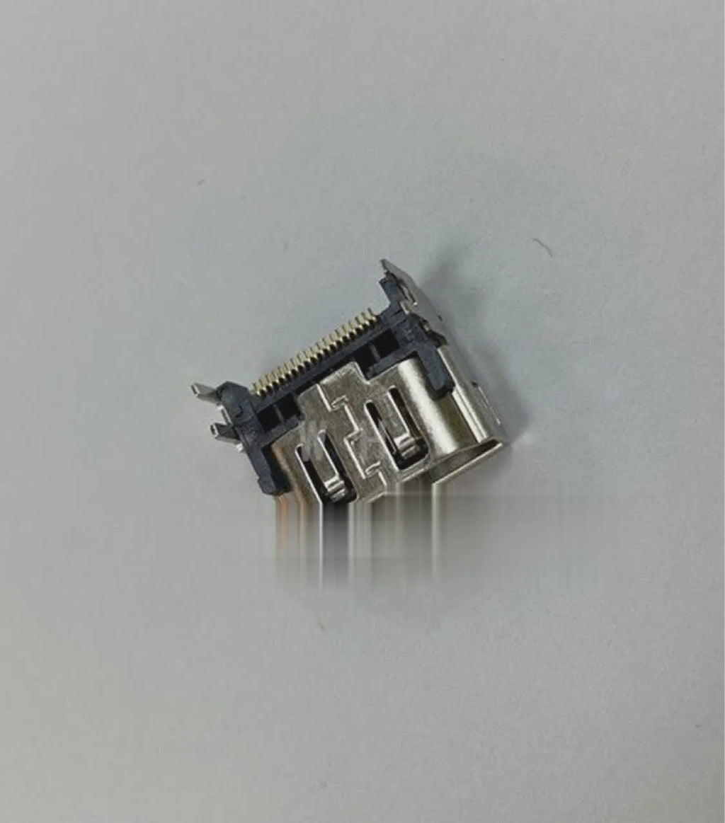 Silver coloured HDMI host socket interface for gaming console accessory.