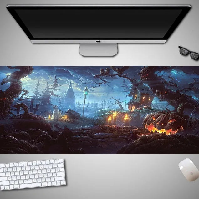 Large Halloween patterned gaming mouse pad on a desk showing non-slip rubber base and extra-long design.
