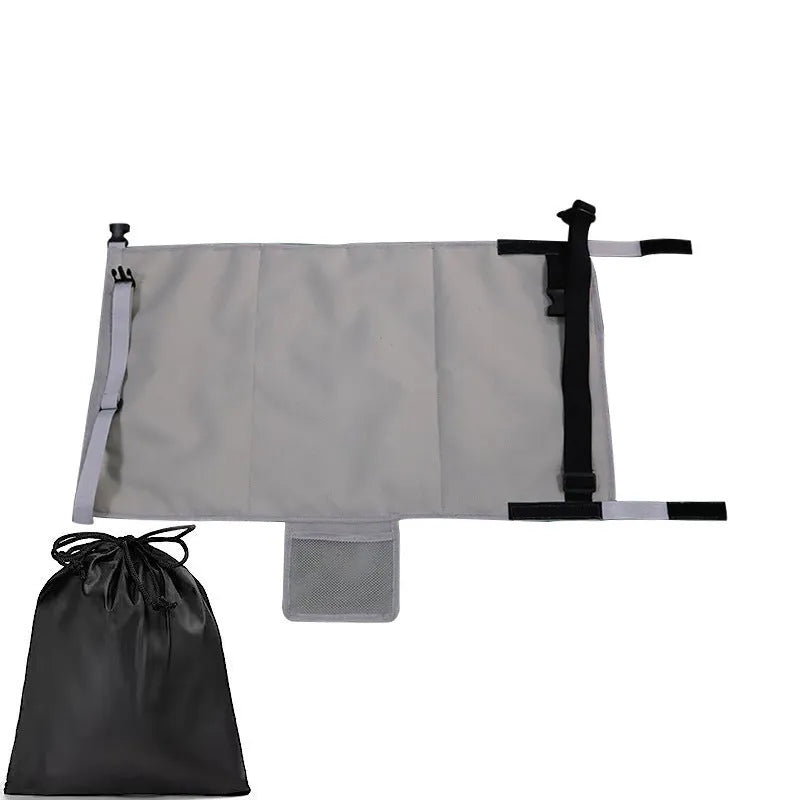 Portable children's aircraft seat extender in blue with adjustable bundle pocket