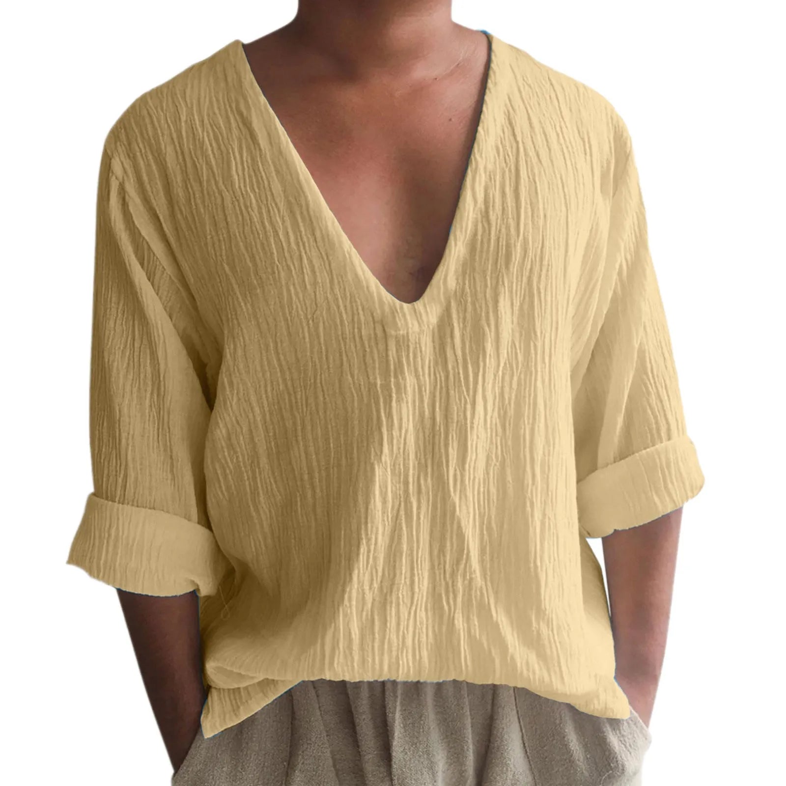 Man wearing a washed cotton long sleeve V-neck t-shirt in a solid colour.