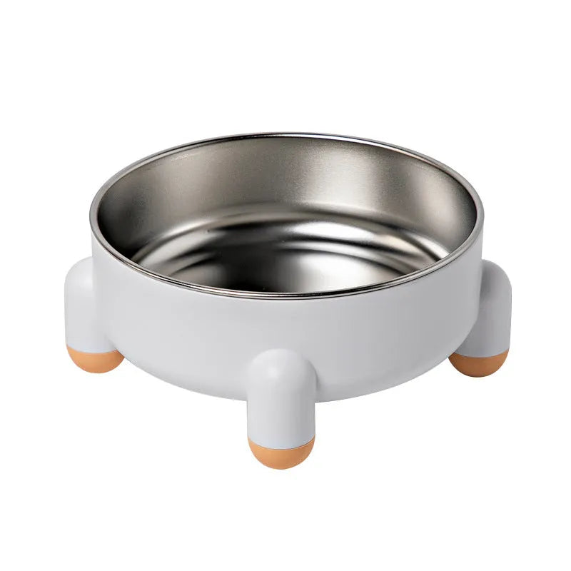 Green non-slip stainless steel pet bowl with high foot base on a floor.