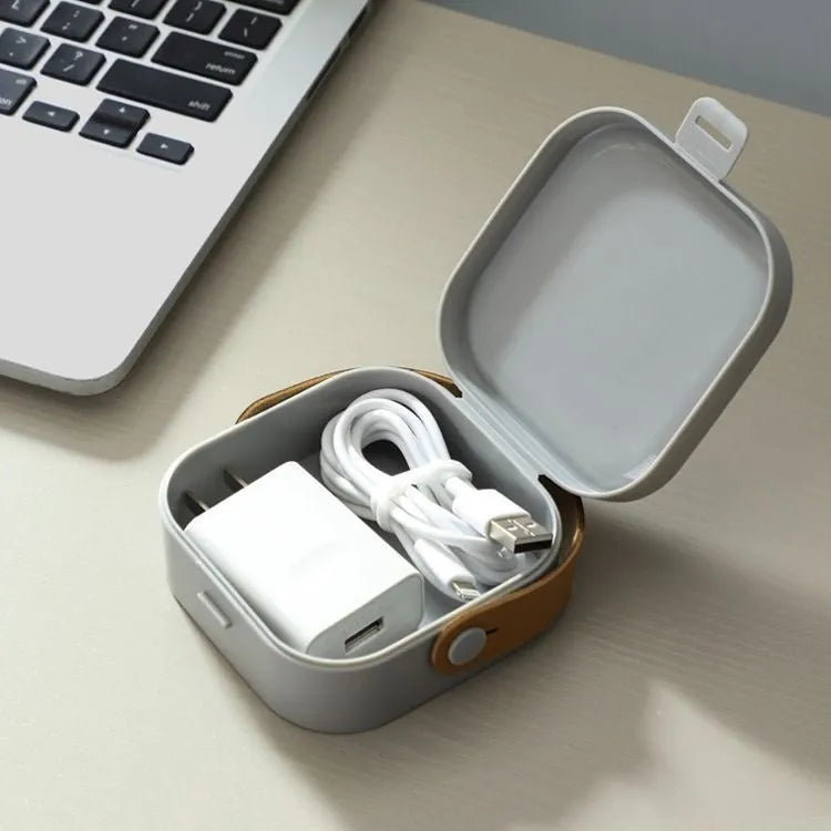 A medium-sized polypropylene storage box for organising cables, shown in Nordic White.