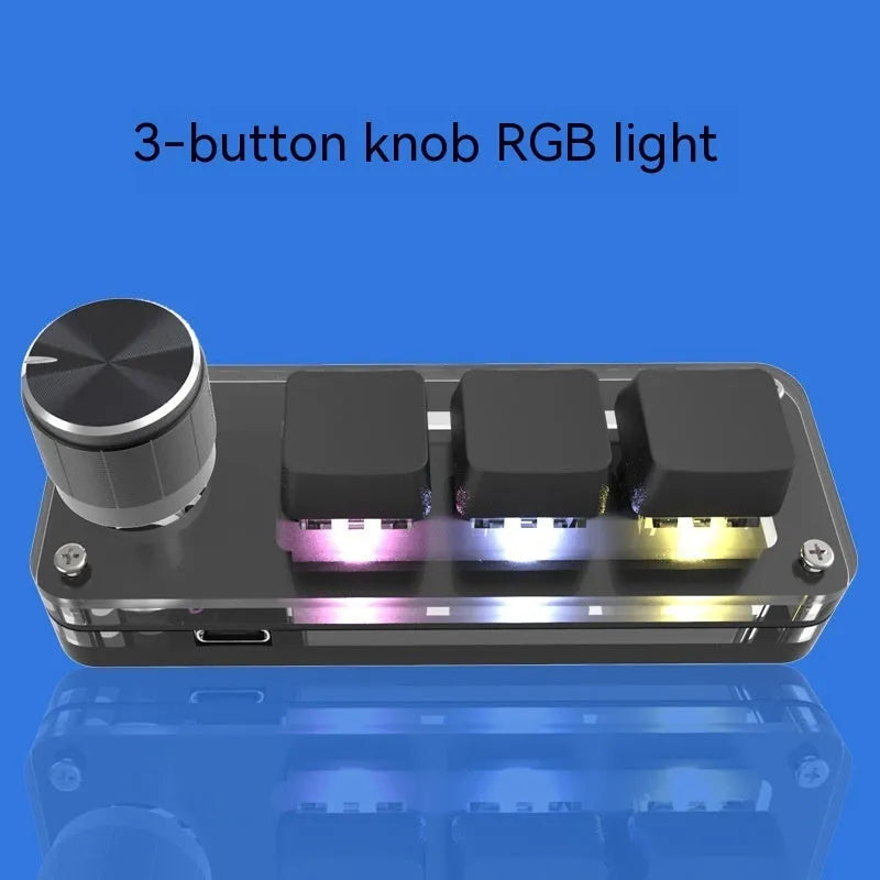 Black programmable macro keypad with RGB backlit keys and USB cable