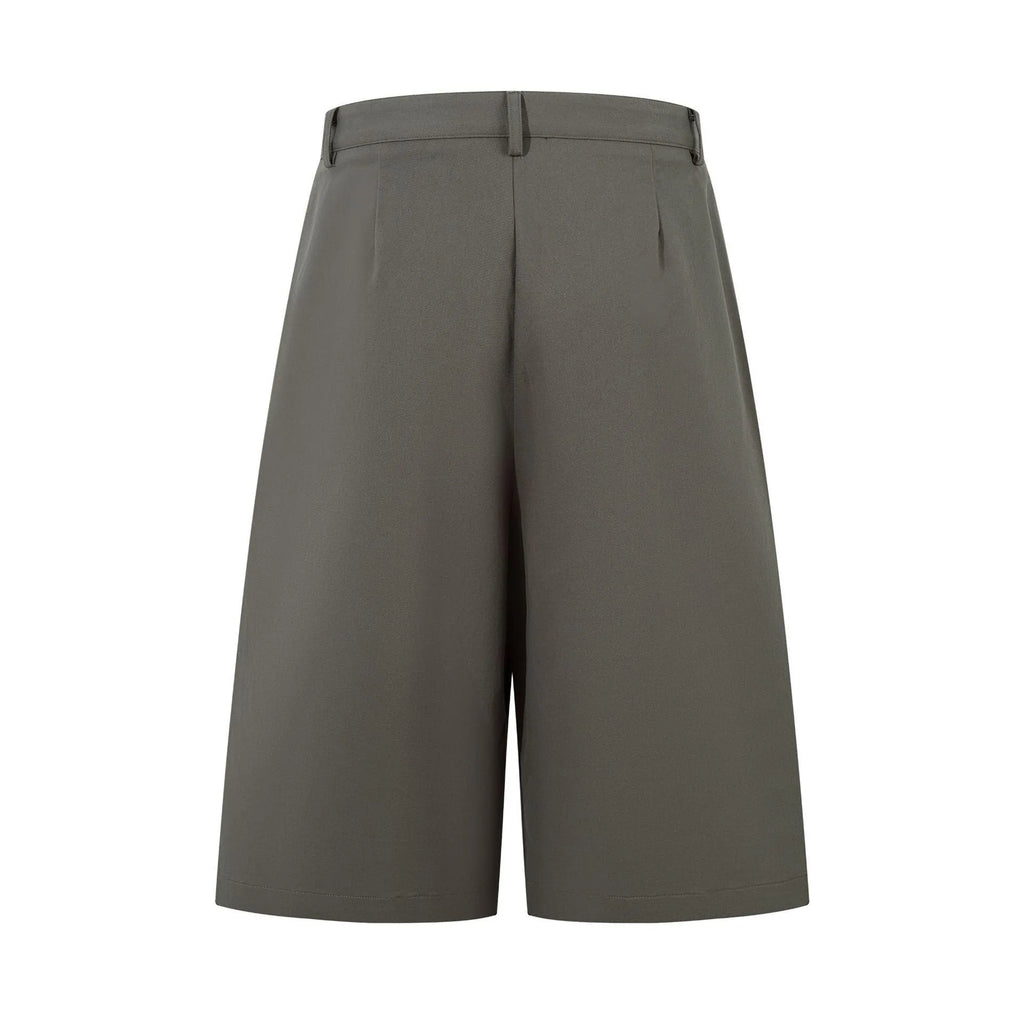 Retro wide leg straight cut denim trousers in mid-calf length, shown in black colour with loose fit silhouette