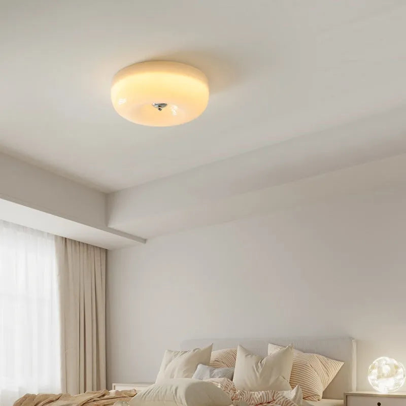 Antique style cream coloured bedroom ceiling lamp with three-colour light adjustment.
