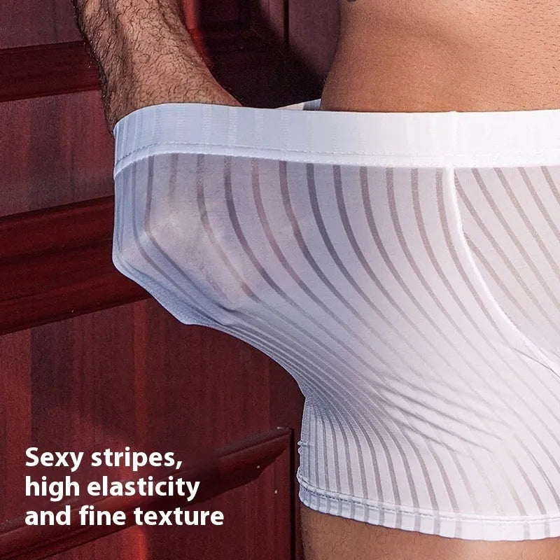Men's black and white striped nylon boxer briefs laid flat, showing elastic waistband and free-size fit.