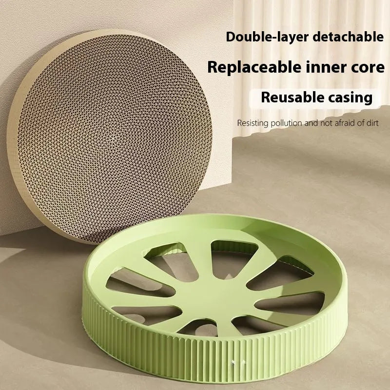 Round green and white cat scratching board with corrugated paper surface and replacement pads