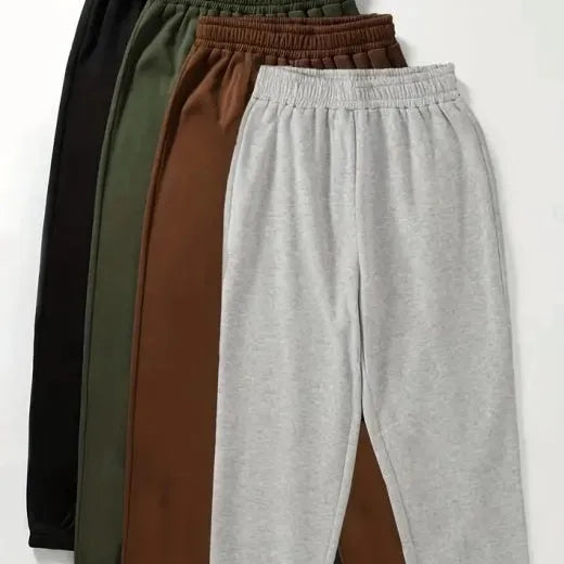 Four women's polyester sweatpants in black, green, brown and grey with straight leg and mid waist design