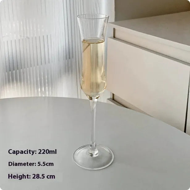 Set of six French-design champagne glasses in various crystal goblet styles including tulip and flute shapes