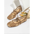 Pink flat heel Mary Jane evening shoes with lace mesh upper and rubber sole.