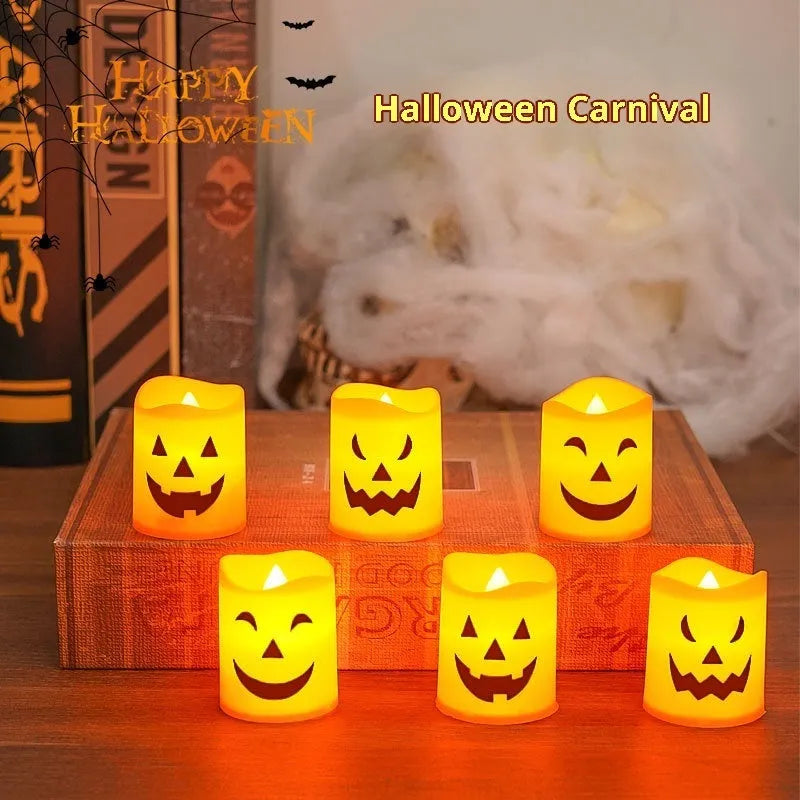 Set of six plastic pumpkin-coloured Halloween electric candle lamps in European style on a dark background