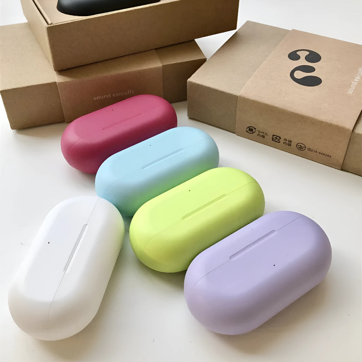 Bone conduction ear clip headset in macaron colours with Qualcomm chip and 20 metre range