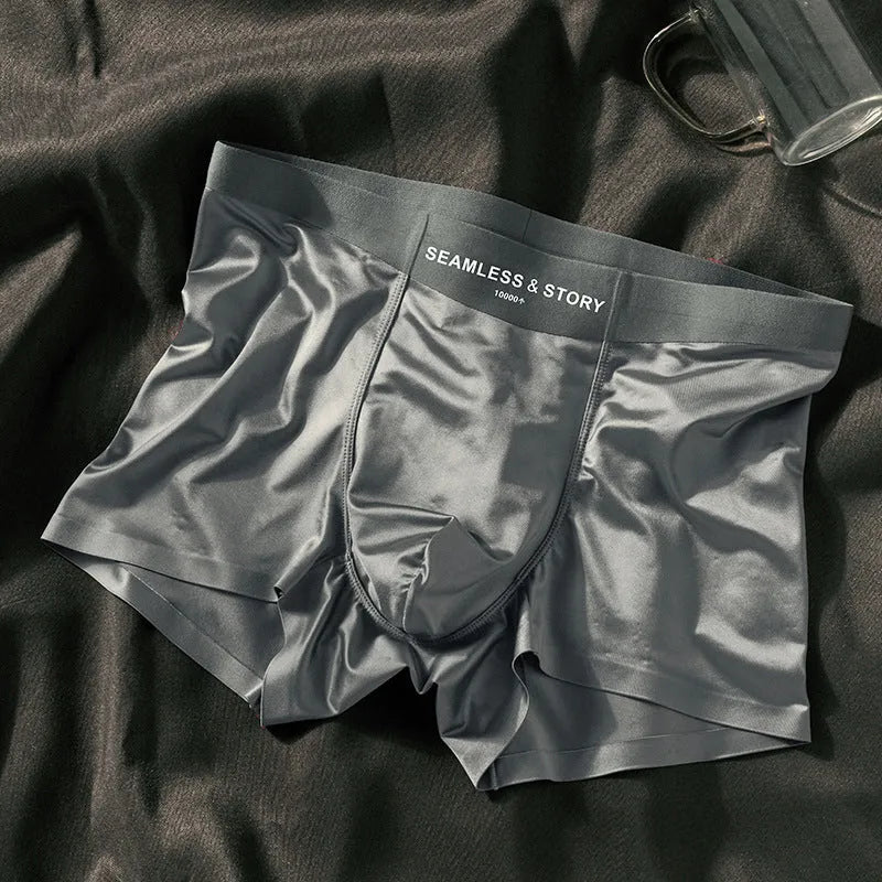 Men's ice silk underwear in multiple colours showing mid-waist design and smooth fabric texture