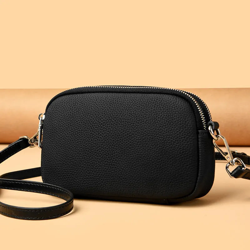 Small square shoulder messenger bag in first layer cowhide with sewing line detail