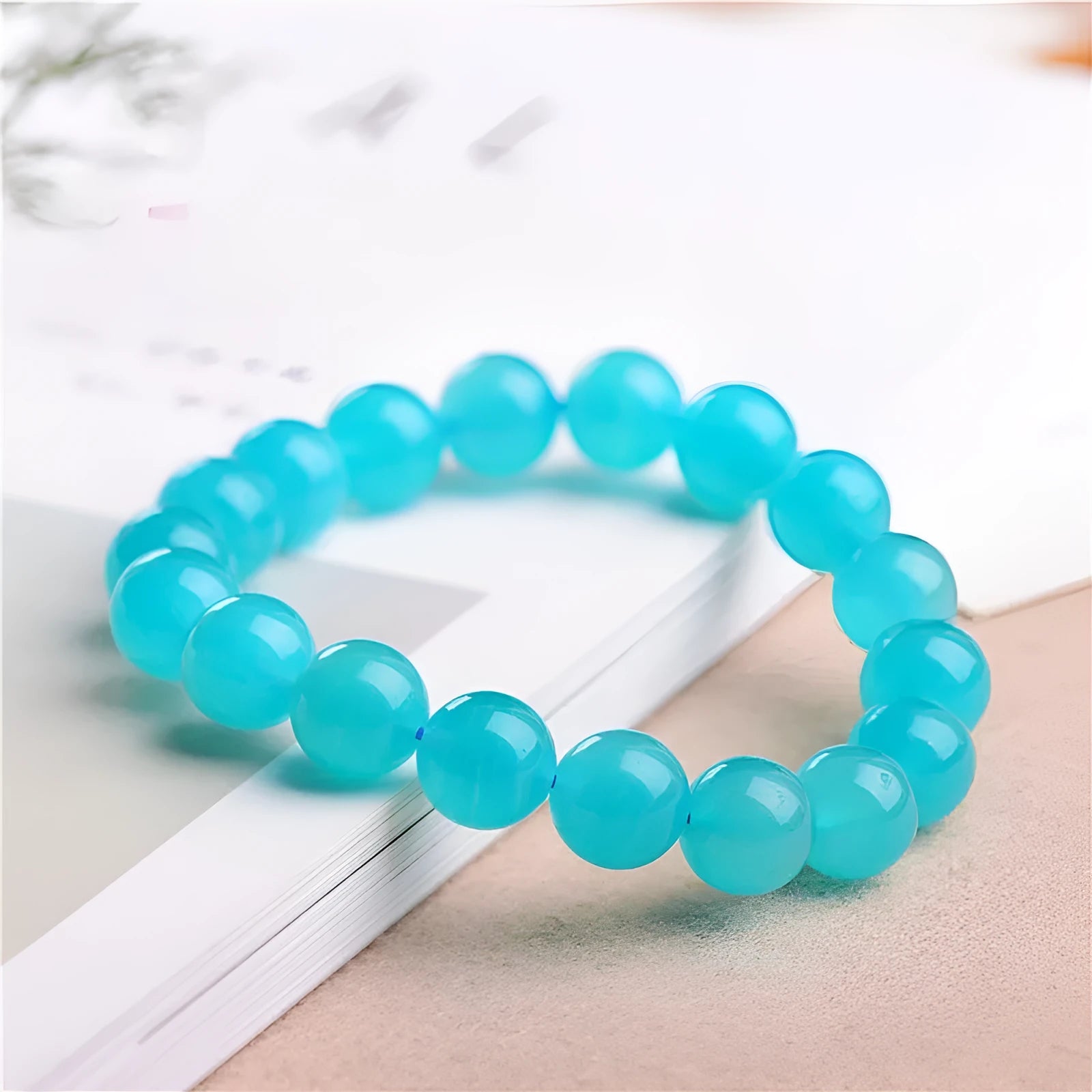 Natural Grade 7A Amazonite scattered beads in ice colour, showing polished surfaces and multiple size options for jewellery making.