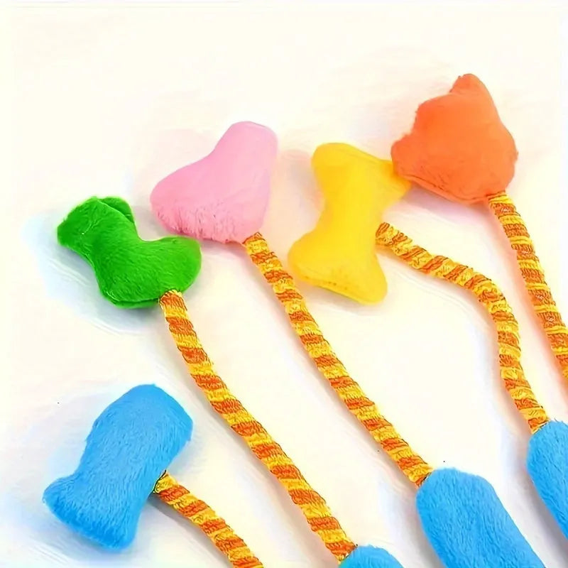 Yellow and blue Magic Glove cat teaser toy with plush bell trailer on a 40cm long handle.