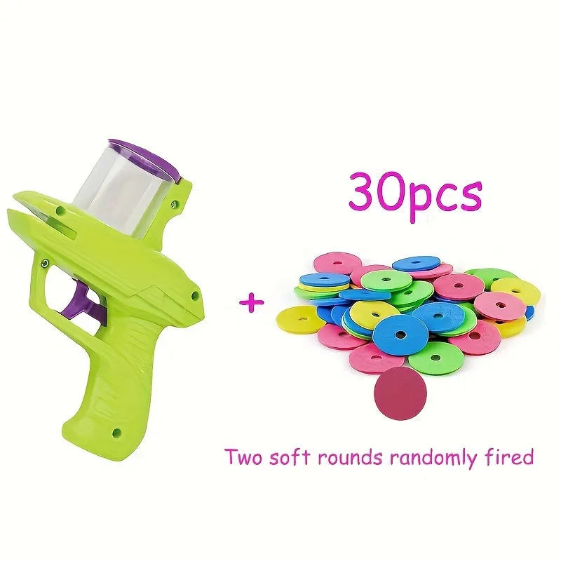 Green and purple durable plastic cat toy launcher with foam discs for battery-free interactive play